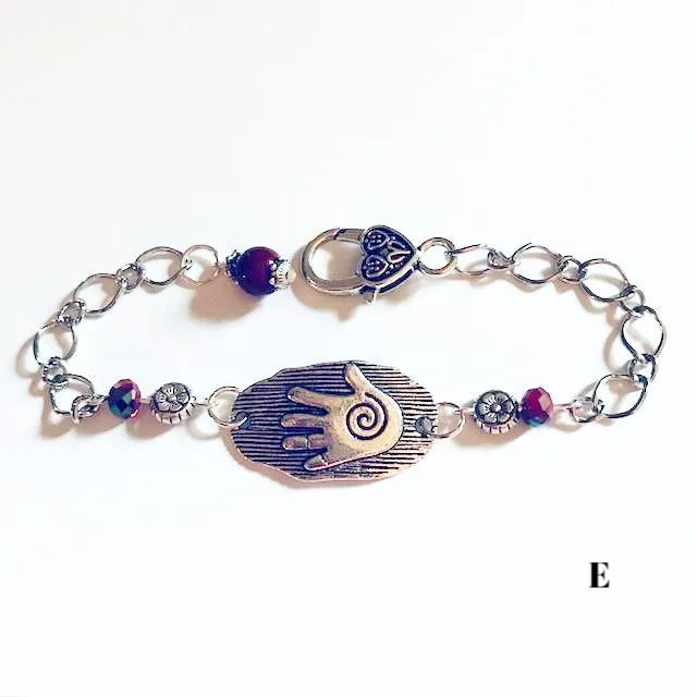 chain bracelets with  swirl centered hand