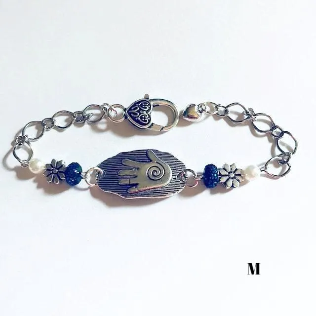 chain bracelets with  swirl centered hand
