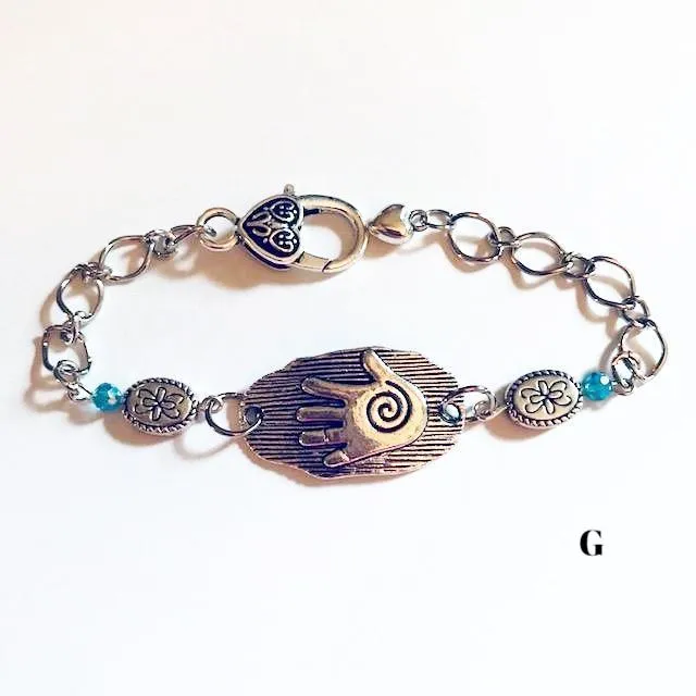 chain bracelets with  swirl centered hand
