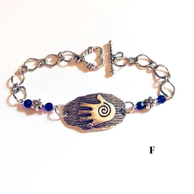 chain bracelets with  swirl centered hand