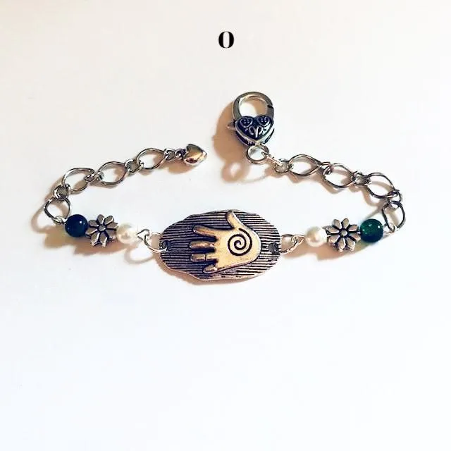 chain bracelets with  swirl centered hand