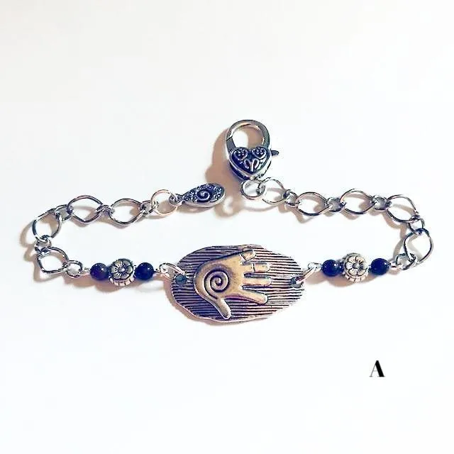 chain bracelets with  swirl centered hand