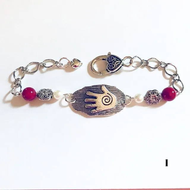 chain bracelets with  swirl centered hand