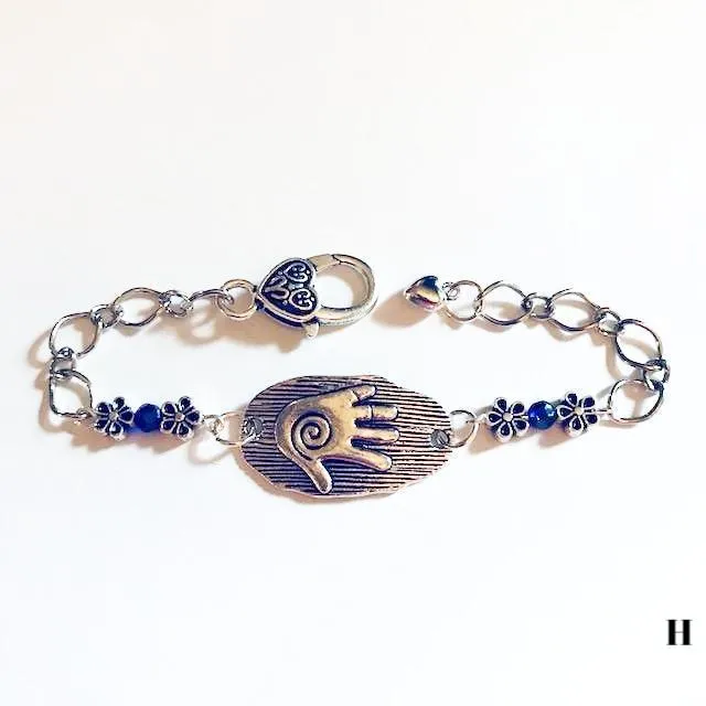chain bracelets with  swirl centered hand