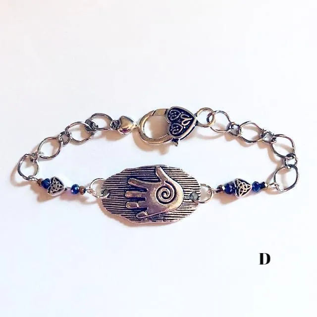 chain bracelets with  swirl centered hand