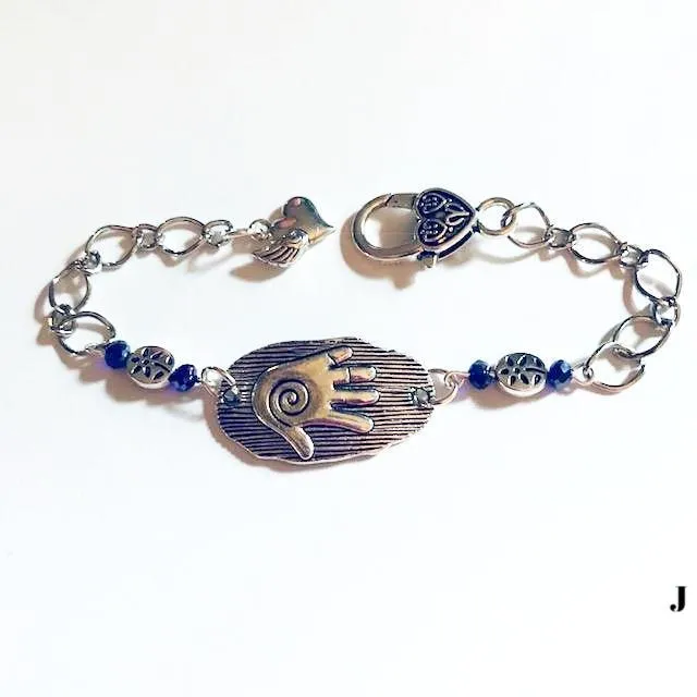 chain bracelets with  swirl centered hand